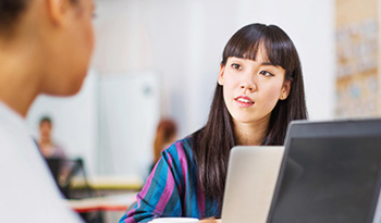 people collaborating in office