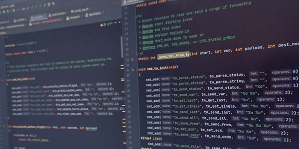 close up of code shown on two screens
